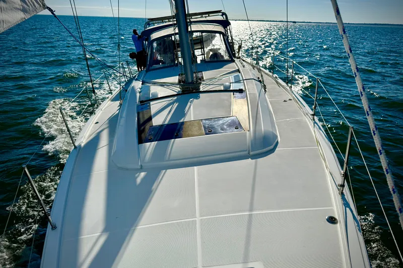 Yacht Photos Pics 2020 Beneteau Oceanis 51.1 sailing on open water under clear skies.