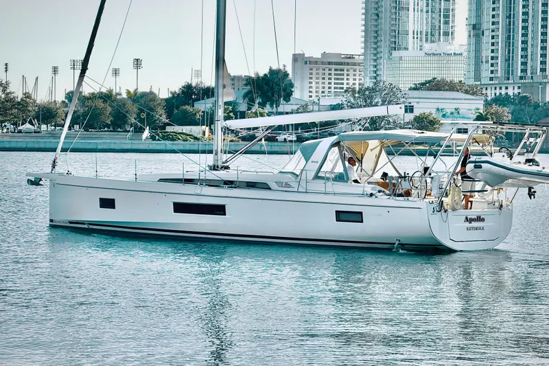  Yacht Photos Pics 2020 Beneteau Oceanis 51.1 sailboat docked in urban marina setting.