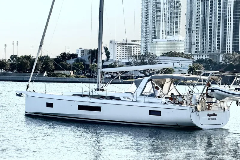  Yacht Photos Pics 2020 Beneteau Oceanis 51.1 sailboat docked in urban marina setting.