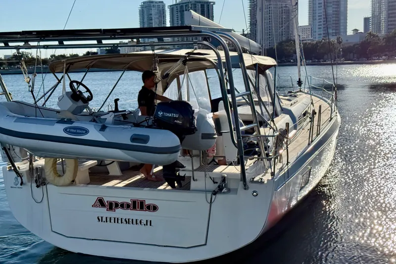  Yacht Photos Pics 2020 Beneteau Oceanis 51.1 sailboat named Apollo in a sunny marina setting.