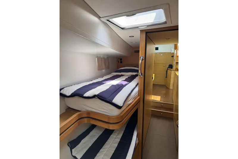  Yacht Photos Pics Interior of 2023 Garcia SLOOP ALUMINIUM 51 yacht with cozy bunk beds.