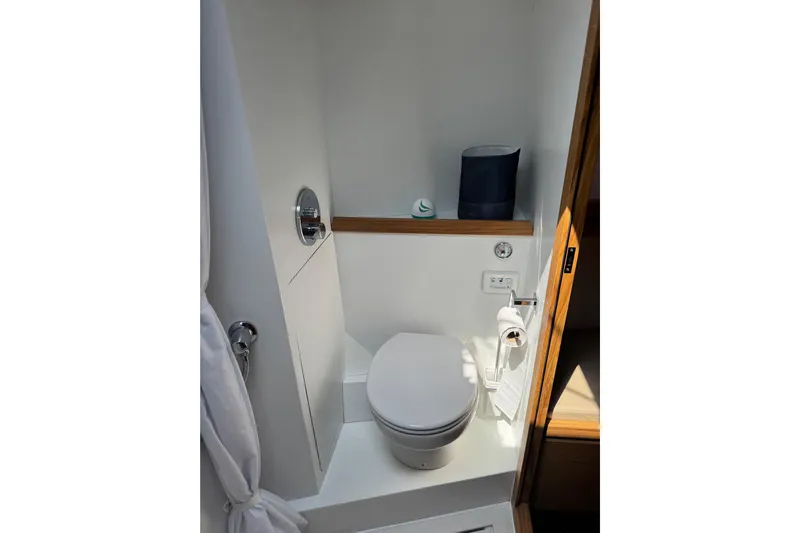  Yacht Photos Pics Modern bathroom in 2023 Garcia SLOOP ALUMINIUM 51 yacht, featuring compact design and amenities.