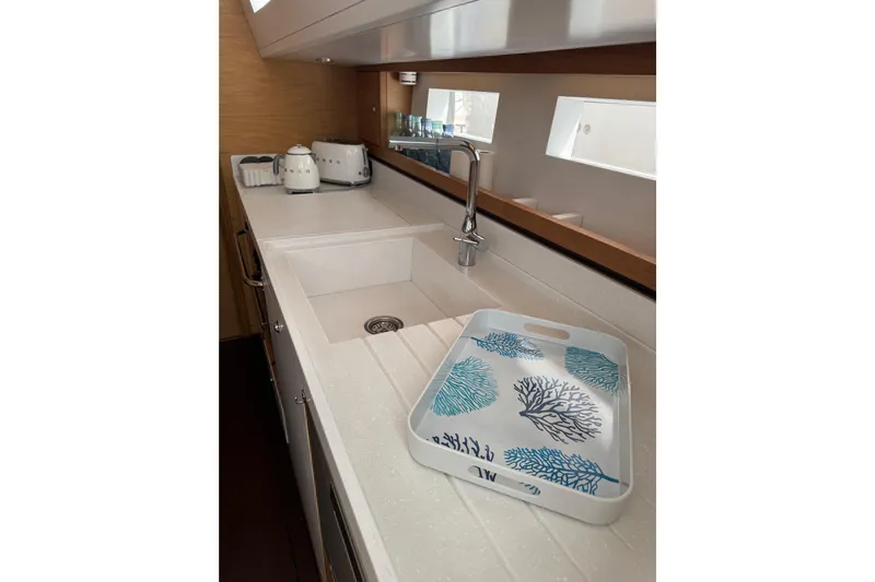  Yacht Photos Pics Modern kitchen in 2023 Garcia SLOOP ALUMINIUM 51 yacht with sleek sink and decorative tray.