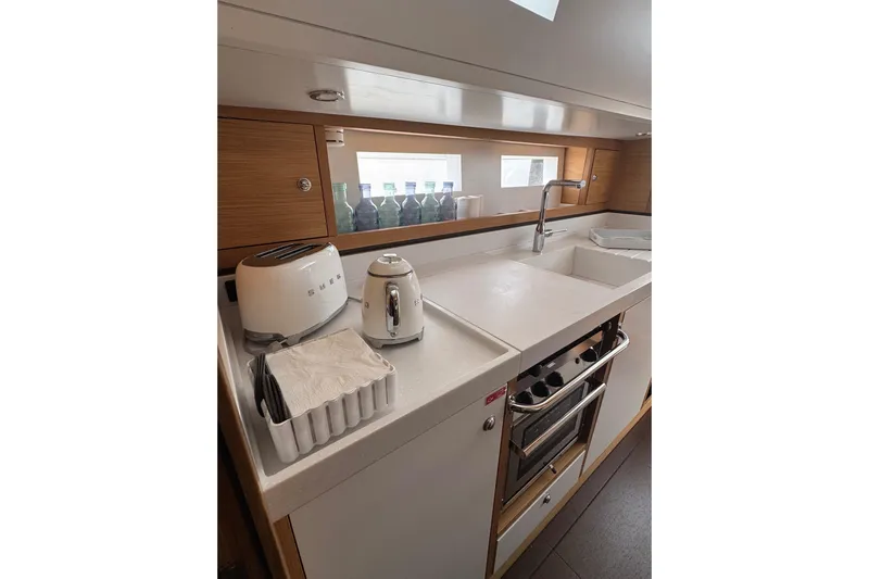  Yacht Photos Pics Modern kitchen in 2023 Garcia SLOOP ALUMINIUM 51 yacht with appliances and sink.