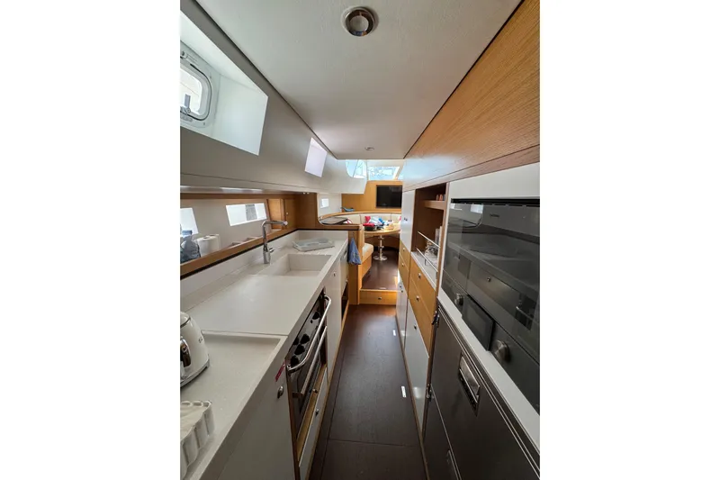  Yacht Photos Pics Modern kitchen interior of 2023 Garcia SLOOP ALUMINIUM 51 yacht, featuring sleek design and appliances.