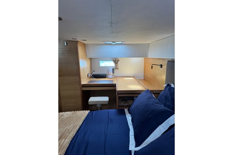  Yacht Photos Pics Interior of 2023 Garcia Sloop Aluminium 51 yacht with cozy bedroom and desk area.