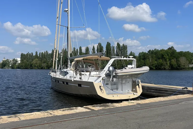  Yacht Photos Pics 2023 Garcia SLOOP ALUMINIUM 51 yacht docked by a serene waterfront.