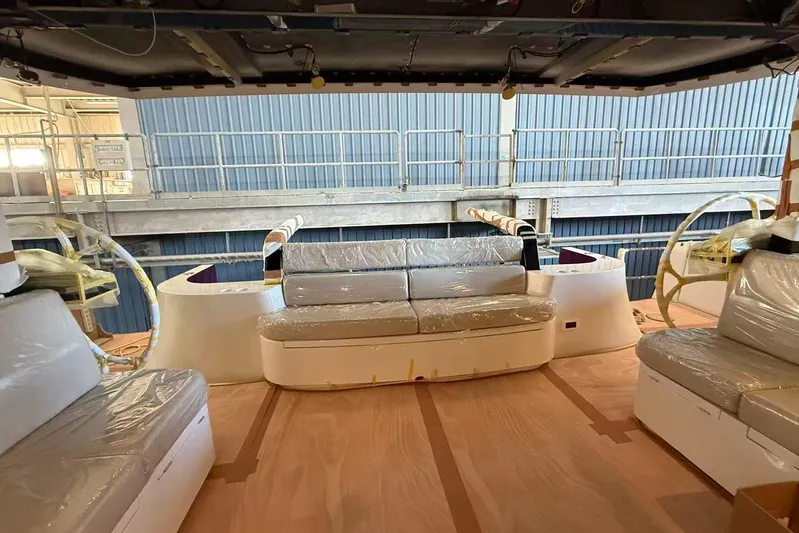  Yacht Photos Pics Interior of 2026 HH Catamarans HH44 SC, featuring modern seating and helm stations.