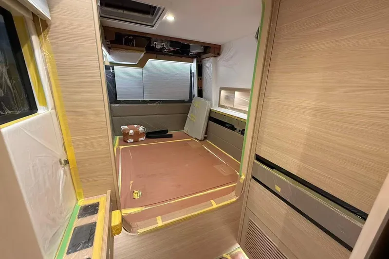  Yacht Photos Pics Interior of 2026 HH Catamarans HH44 SC under construction, featuring modern wood paneling.