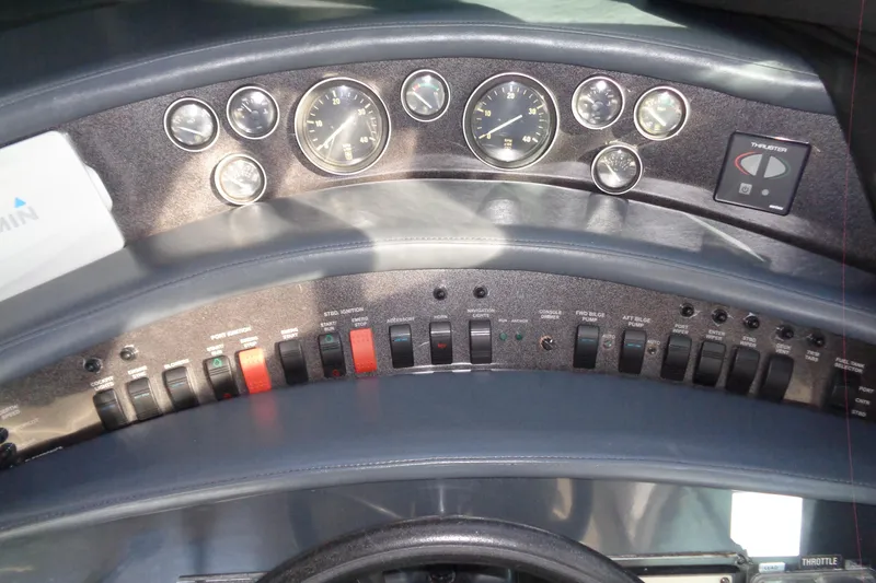 Snri Yacht Photos Pics Control panel of a 1991 Sea Ray 480 Sundancer boat with gauges and switches.