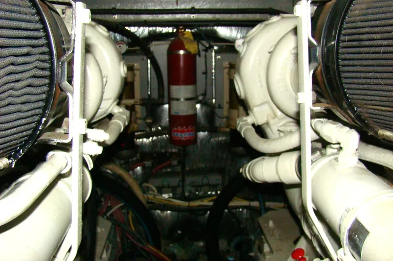 Snri Yacht Photos Pics Engine room of 1991 Sea Ray 480 Sundancer with visible components and fire extinguisher.