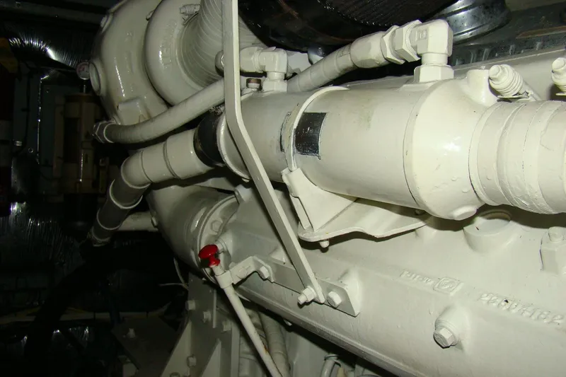 Snri Yacht Photos Pics Engine components of a 1991 Sea Ray 480 Sundancer boat, featuring pipes and fittings.