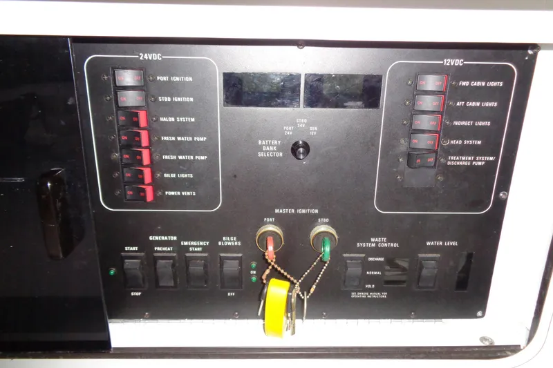 Snri Yacht Photos Pics Control panel of a 1991 Sea Ray 480 Sundancer boat, featuring various switches and indicators.