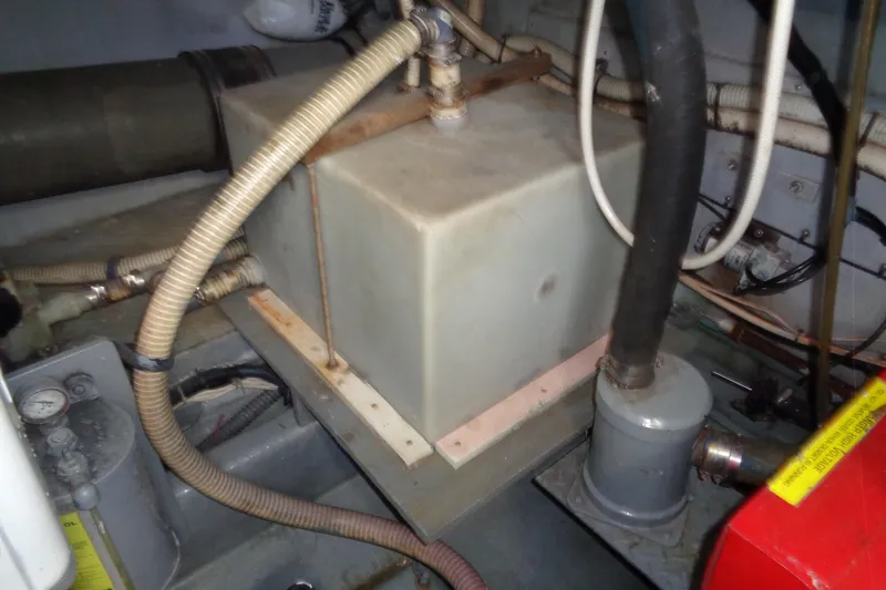 Snri Yacht Photos Pics Engine room of 1991 Sea Ray 480 Sundancer with hoses and equipment.