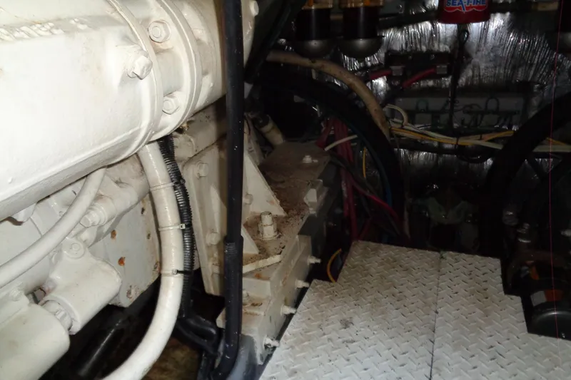 Snri Yacht Photos Pics Engine room of a 1991 Sea Ray 480 Sundancer with visible machinery and wiring.