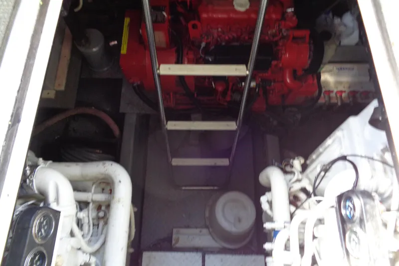 Snri Yacht Photos Pics Engine room of 1991 Sea Ray 480 Sundancer with visible machinery and components.