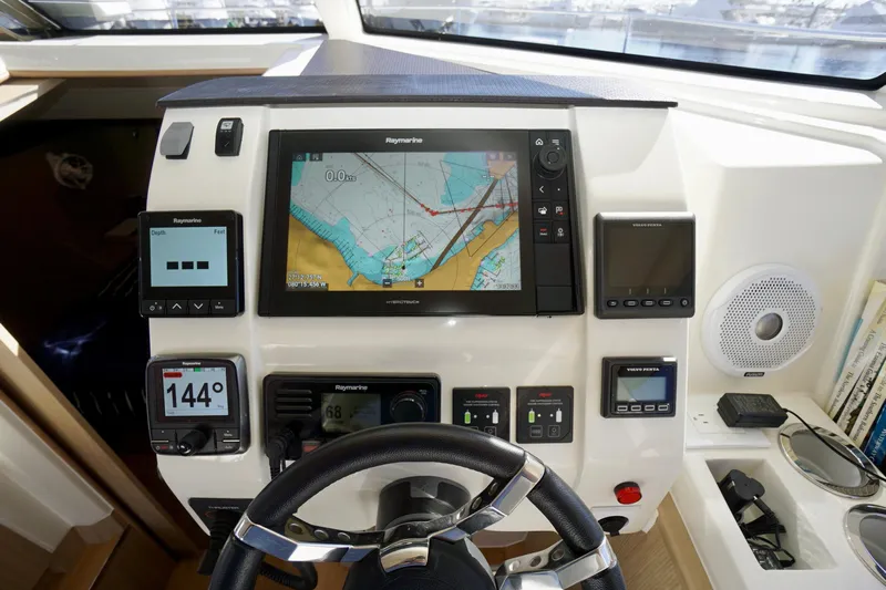  Yacht Photos Pics Control panel of 2020 Aquila 44 Yacht with navigation and monitoring systems.