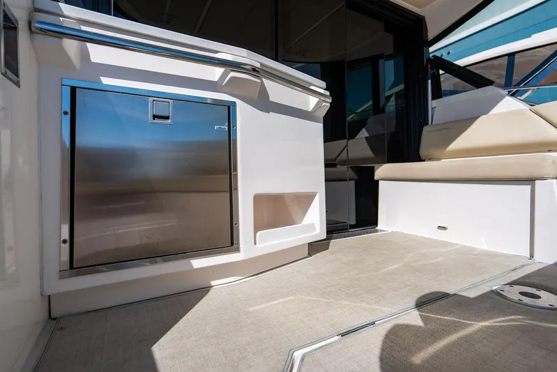 2021 Regal 38 Xo Yacht Photos Pics 2021 Regal 38 XO yacht interior with seating and stainless steel features.