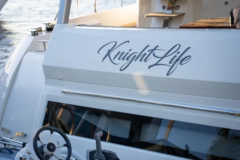 Knightlife Yacht Photos Pics Luxury yacht "Knight Life," Prestige 630, 2017 model, docked by the water.