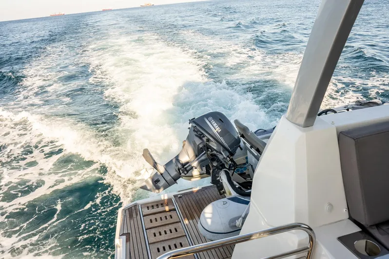 Knightlife Yacht Photos Pics 2017 Prestige 630 yacht cruising on open sea, showcasing powerful engine and wake.