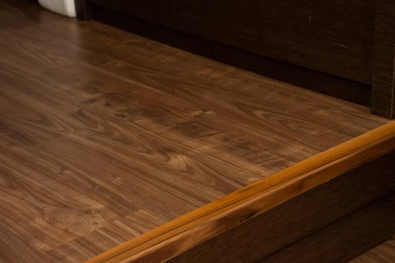 Knightlife Yacht Photos Pics Wooden flooring detail on a 2017 Prestige 630 yacht interior.