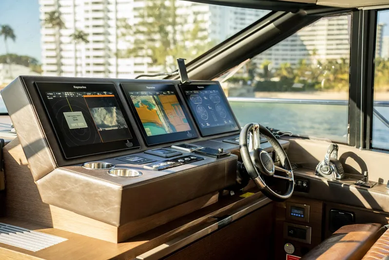 Knightlife Yacht Photos Pics Luxurious 2017 Prestige 630 yacht helm with advanced navigation displays and steering wheel.