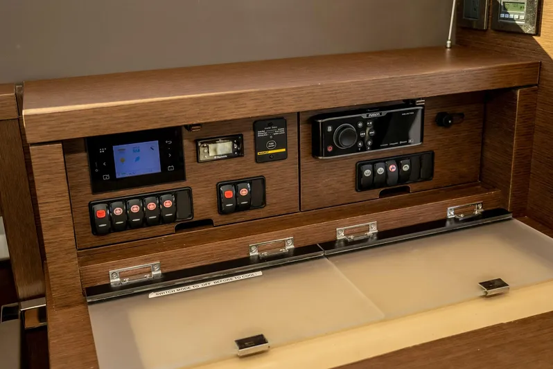 Knightlife Yacht Photos Pics Control panel of a 2017 Prestige 630 yacht with various switches and displays.