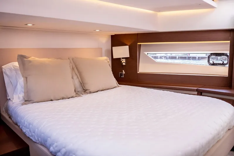 Knightlife Yacht Photos Pics Luxurious bedroom interior of 2017 Prestige 630 yacht with modern design and cozy bedding.