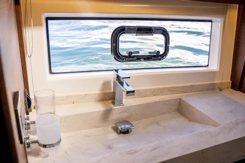 Knightlife Yacht Photos Pics Luxury yacht bathroom sink with ocean view, Prestige 630, 2017 model.