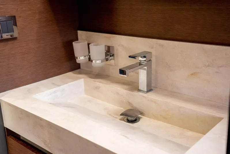 Knightlife Yacht Photos Pics Modern bathroom sink with marble countertop and sleek chrome faucet, Prestige 630, 2017 model.