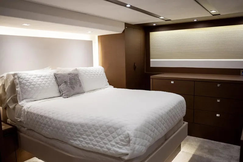 Knightlife Yacht Photos Pics Luxurious bedroom interior of 2017 Prestige 630 yacht with modern design and elegant furnishings.