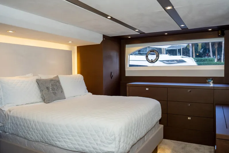 Knightlife Yacht Photos Pics Luxurious bedroom interior of 2017 Prestige 630 yacht with modern design and elegant furnishings.