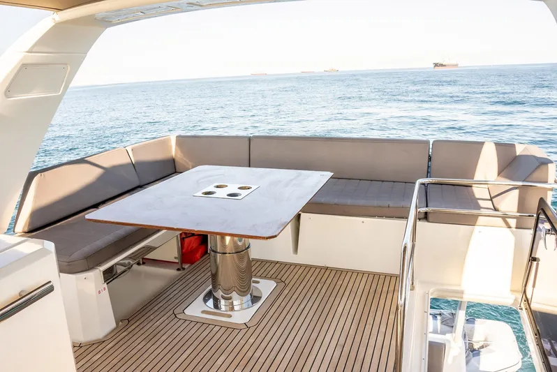 Knightlife Yacht Photos Pics Luxurious 2017 Prestige 630 yacht deck with seating and ocean view.