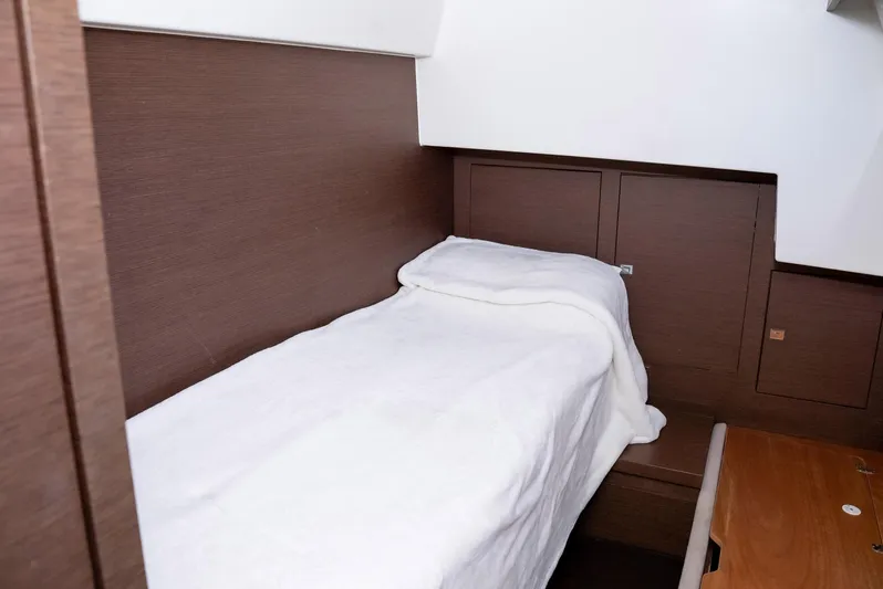 Knightlife Yacht Photos Pics Single bed in 2017 Prestige 630 yacht cabin with wooden interior.