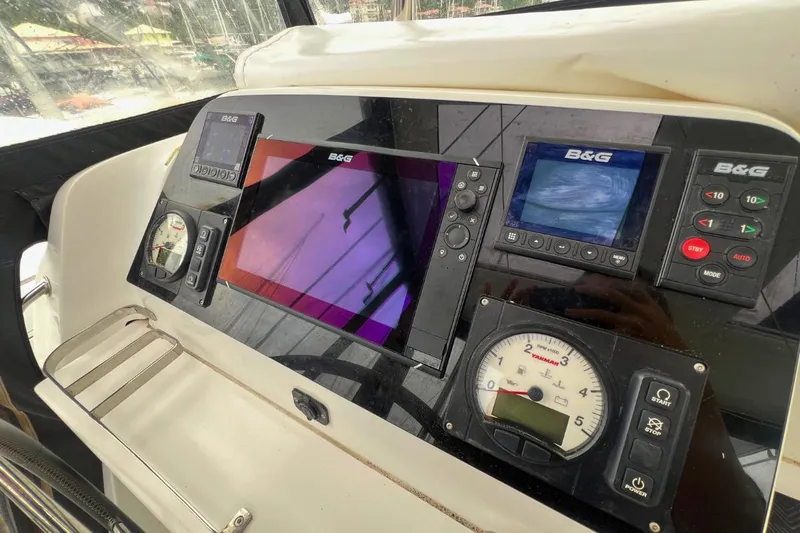 Ile En Ile Yacht Photos Pics Control panel of a 2018 Lagoon 42 catamaran with navigation instruments.