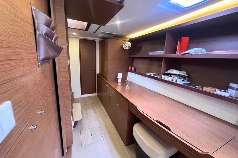 Ile En Ile Yacht Photos Pics Interior of 2018 Lagoon 42 yacht with wooden cabinetry and modern design.