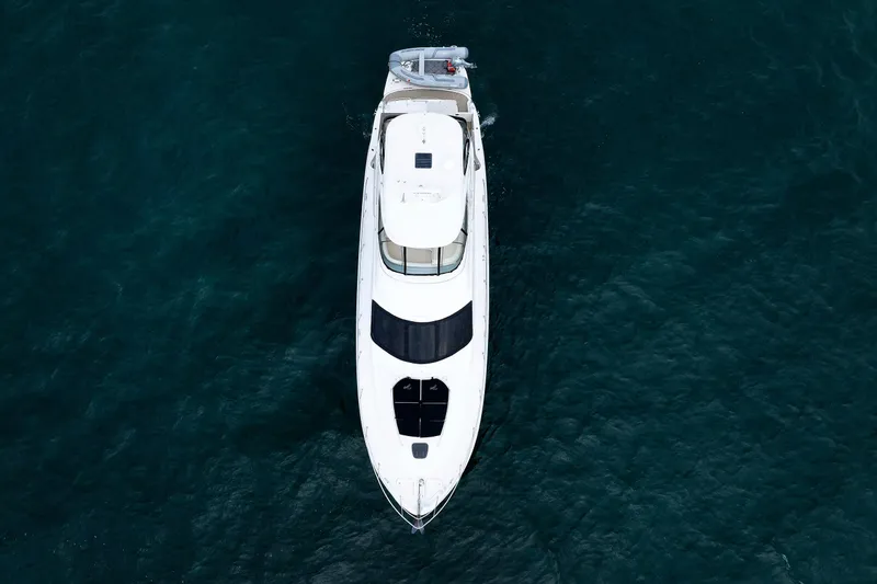  Yacht Photos Pics Overhead view of 2010 Sea Ray 520 Sedan Bridge yacht on open water.