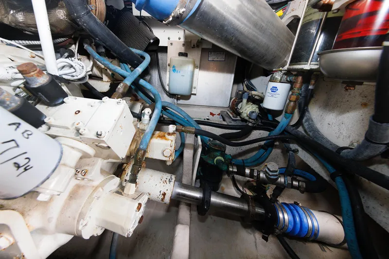  Yacht Photos Pics Engine room of 2010 Sea Ray 520 Sedan Bridge with visible mechanical components.