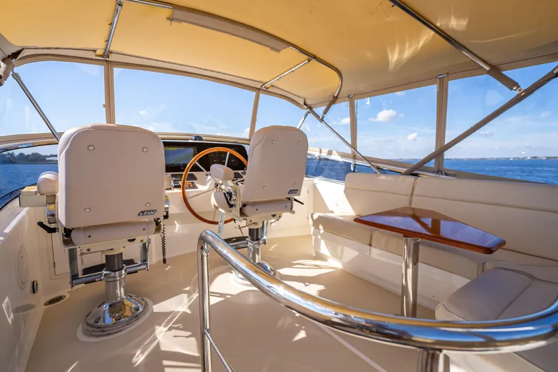 Persistence Yacht Photos Pics 2008 Grand Banks 47 Eastbay FB yacht interior with helm, seating, and ocean view.