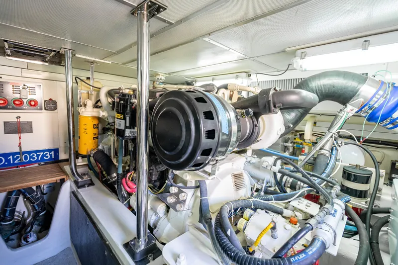 Persistence Yacht Photos Pics Engine room of 2008 Grand Banks 47 Eastbay FB, showcasing mechanical components and wiring.