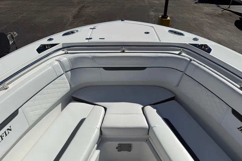  Yacht Photos Pics 2022 Blackfin 272 CC boat interior with white cushioned seating.