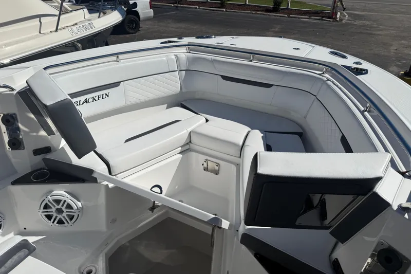 Yacht Photos Pics 2022 Blackfin 272 CC boat interior with white seating and speaker system.