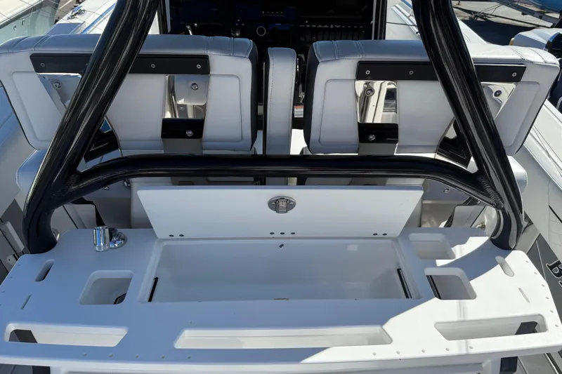  Yacht Photos Pics 2022 Blackfin 272 CC boat interior with seating and storage area.