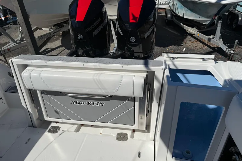  Yacht Photos Pics 2022 Blackfin 272 CC boat with dual Mercury outboard engines, rear seating, and storage.