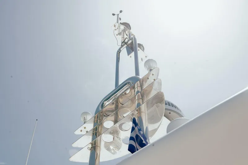 M/y Argo Yacht Photos Pics Antenna and radar equipment on a 2006 Ferretti Yachts 780 under a bright sky.