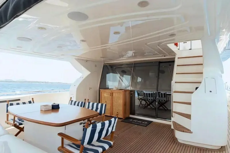 M/y Argo Yacht Photos Pics Luxurious 2006 Ferretti Yachts 780 deck with dining area and ocean view.