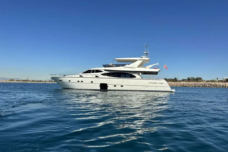 M/y Argo Yacht Photos Pics 2006 Ferretti Yachts 780 cruising on calm blue waters under clear skies.
