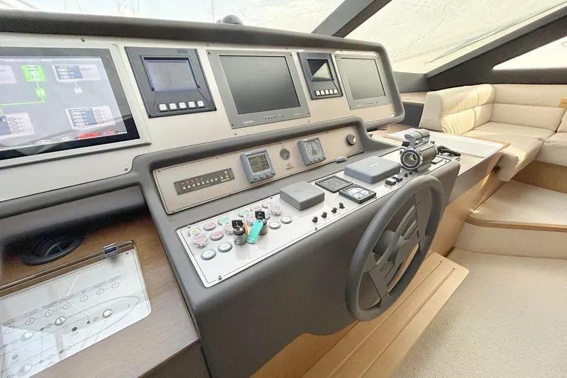 M/y Argo Yacht Photos Pics Helm of 2006 Ferretti Yachts 780 with advanced navigation controls and luxurious seating.