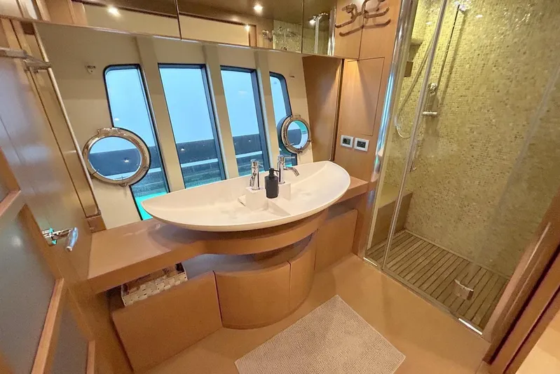 M/y Argo Yacht Photos Pics Luxurious bathroom on 2006 Ferretti Yachts 780 with modern fixtures and elegant design.