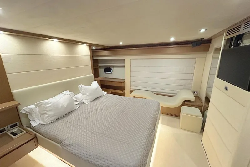 M/y Argo Yacht Photos Pics Luxurious bedroom interior of 2006 Ferretti Yachts 780, featuring modern design and comfortable furnishings.